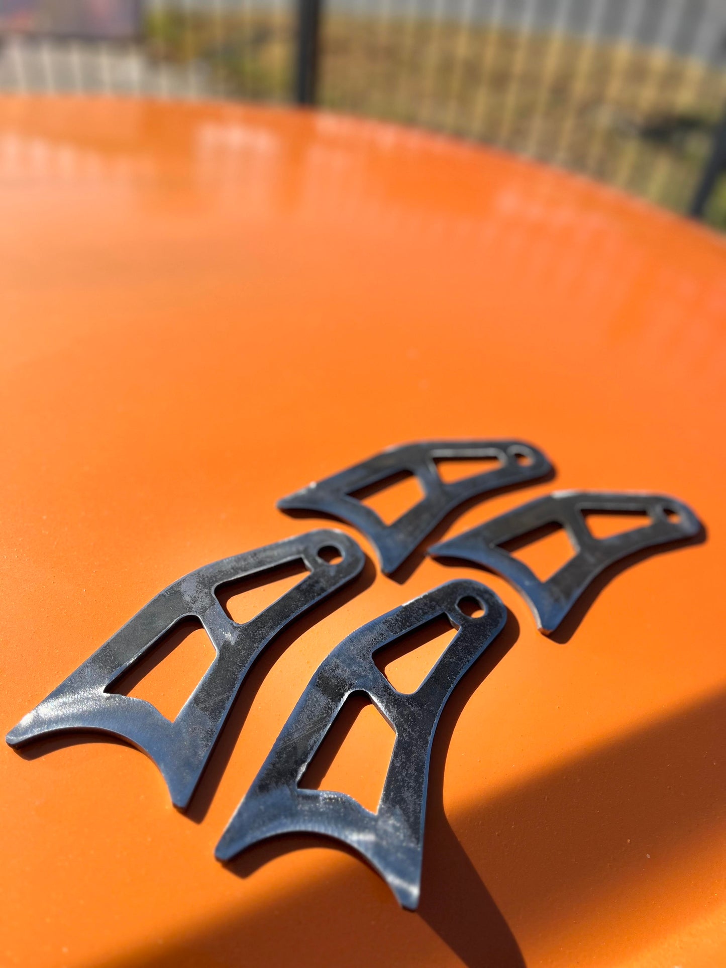 LOWER SHOCK RELOCATION TABS