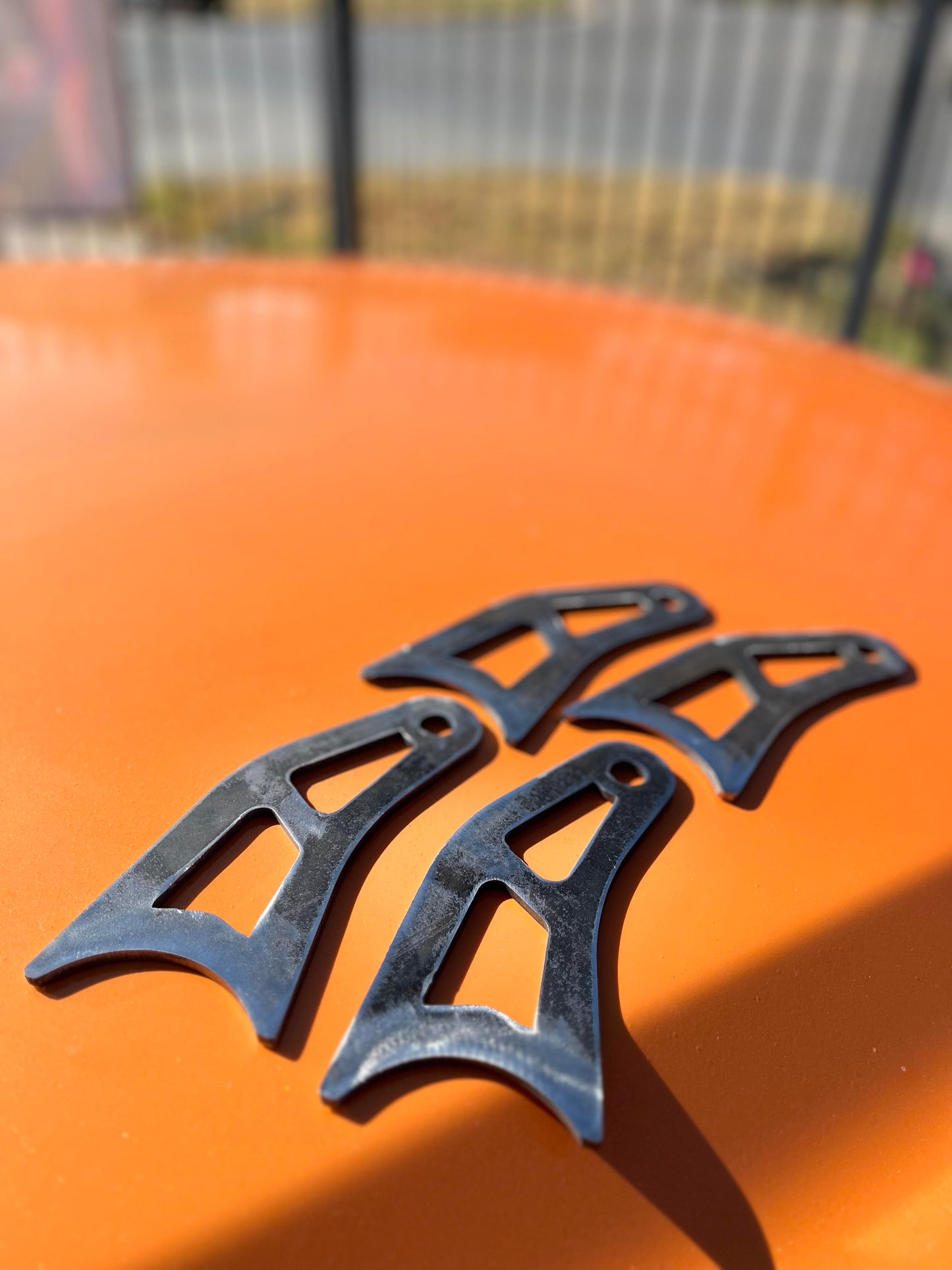 LOWER SHOCK RELOCATION TABS