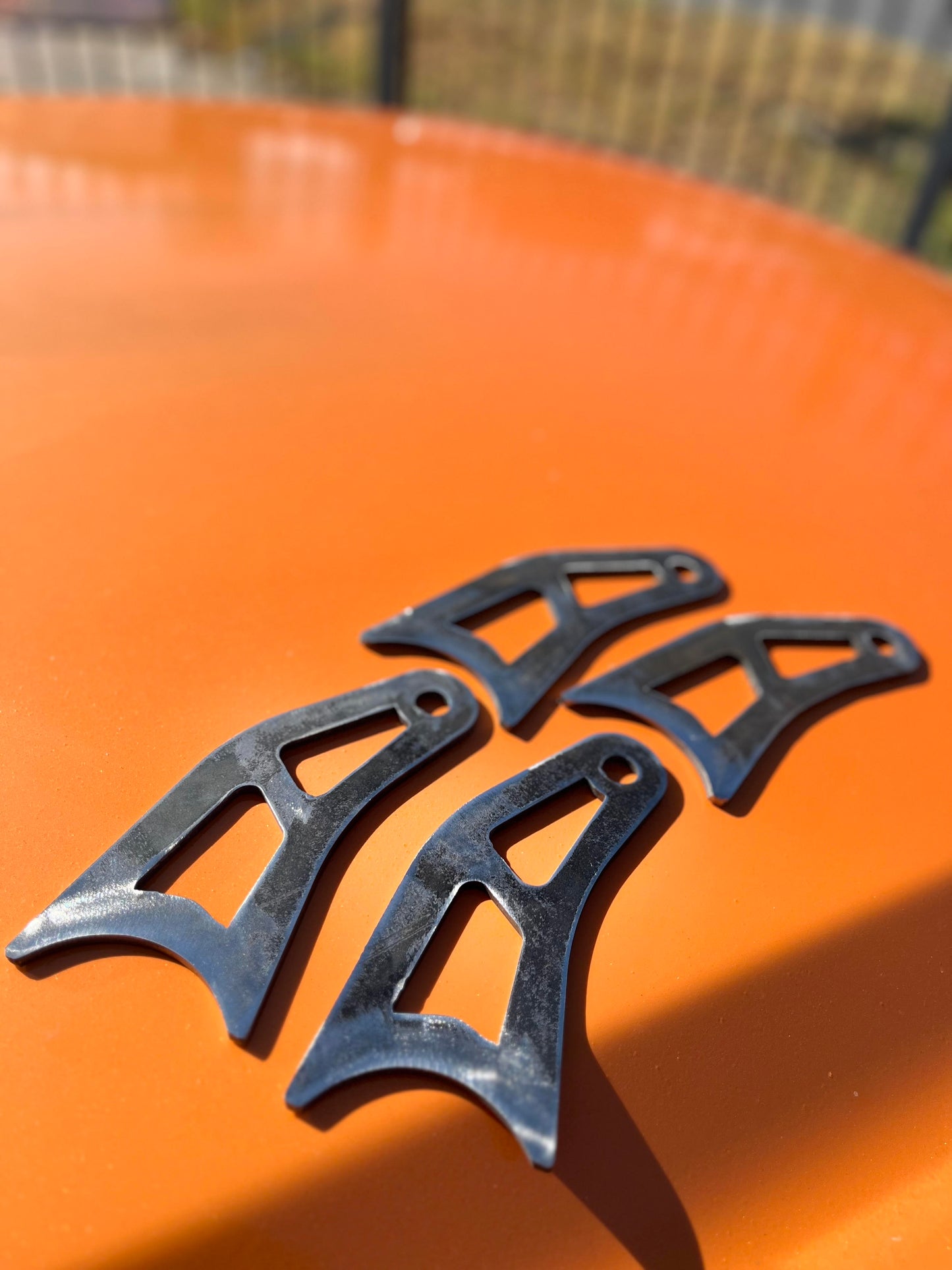 LOWER SHOCK RELOCATION TABS